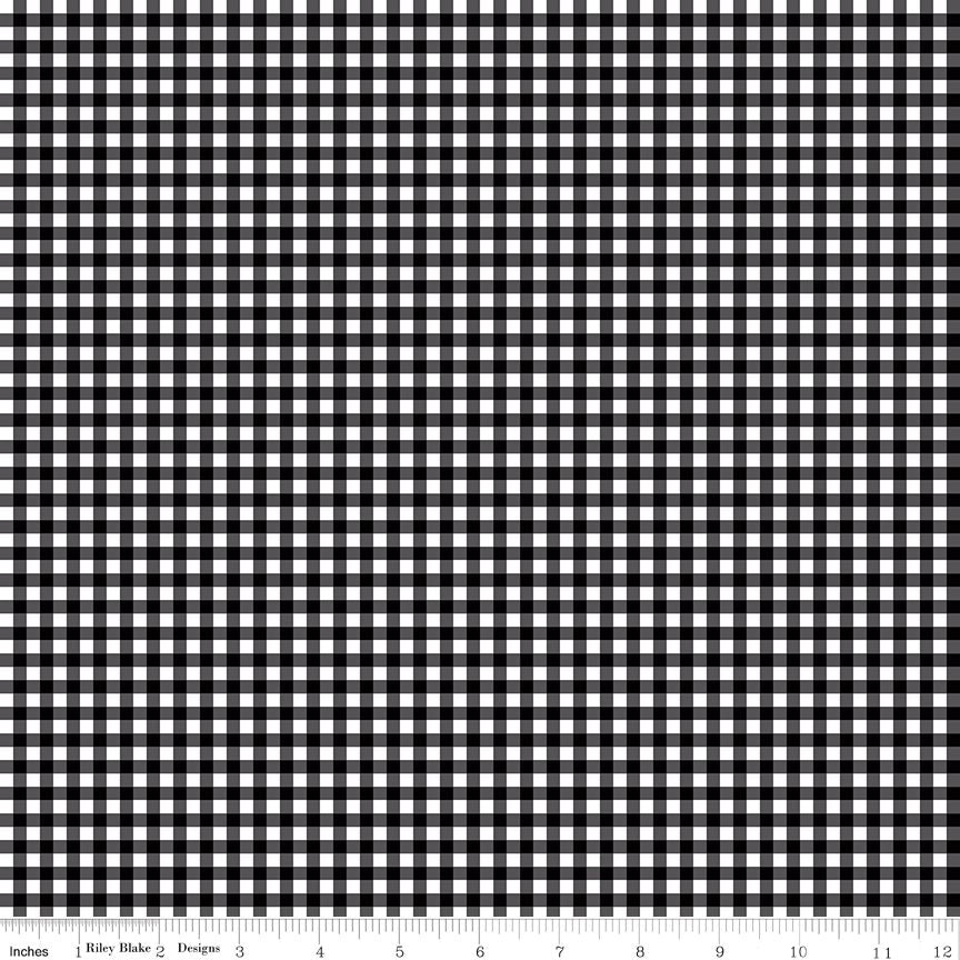 Black and white gingham checkered fabric pattern with a ruler scale at the bottom indicating inches and a 12-inch section.