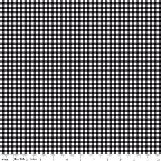 Black and white gingham checkered fabric pattern with a ruler scale at the bottom indicating inches and a 12-inch section.