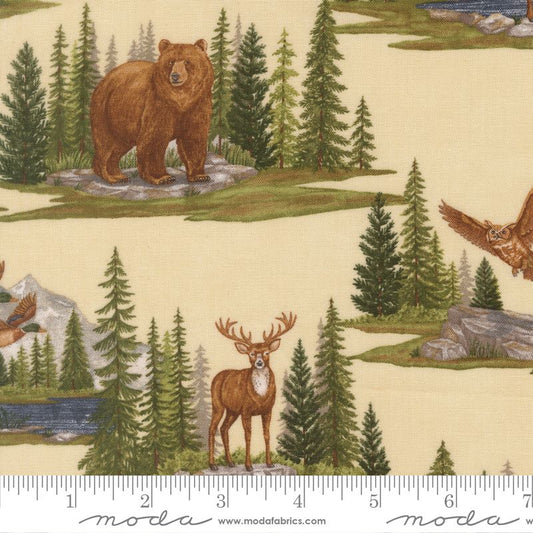 Nature-themed fabric with bears, deer, and owls on a beige background, featuring a Moda label.