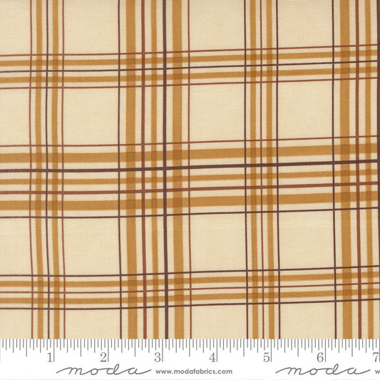 Plaid fabric with brown and cream pattern on a white background, featuring Moda label.