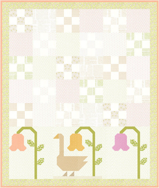 A quilt pattern or fabric design featuring a patchwork background of pastel pink, green, and cream squares, with a row of three stylized flowers at the bottom containing a beige goose, a pink bell, a yellow bell, and a purple bell.