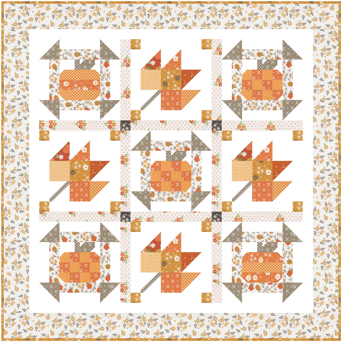 Fall quilt with orange, grey, white and gold leaves and pumpkins on a white background with a white flowered border.  
