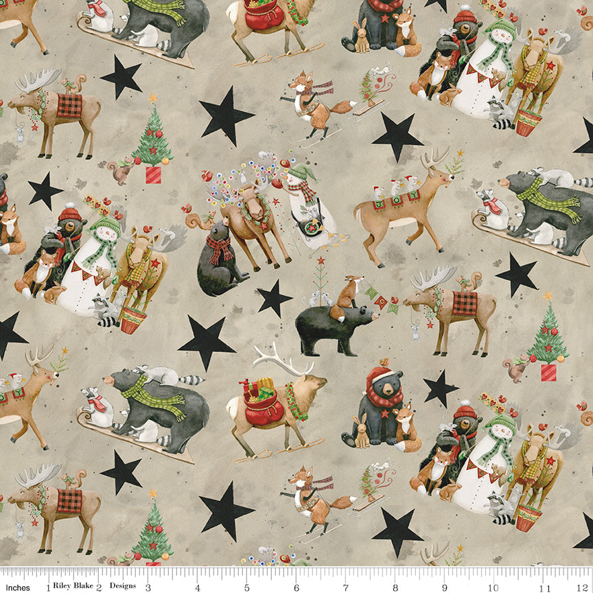 Christmas-themed fabric with reindeer, snowmen, and stars on a beige background.