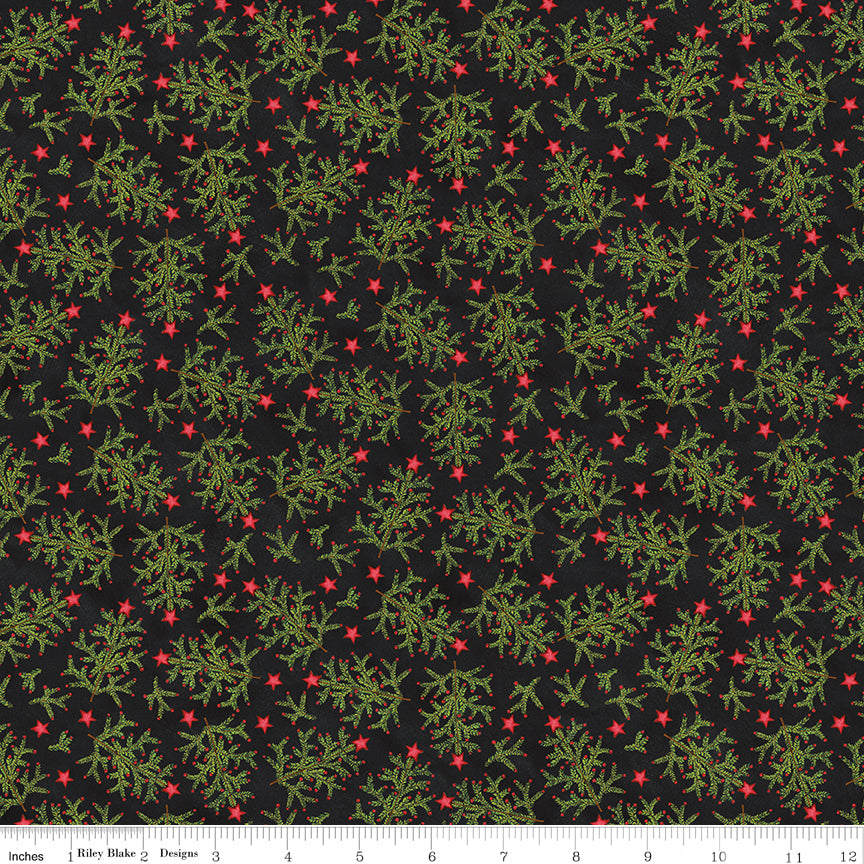 Green Christmas trees on a black background with a ruler at the bottom for scale