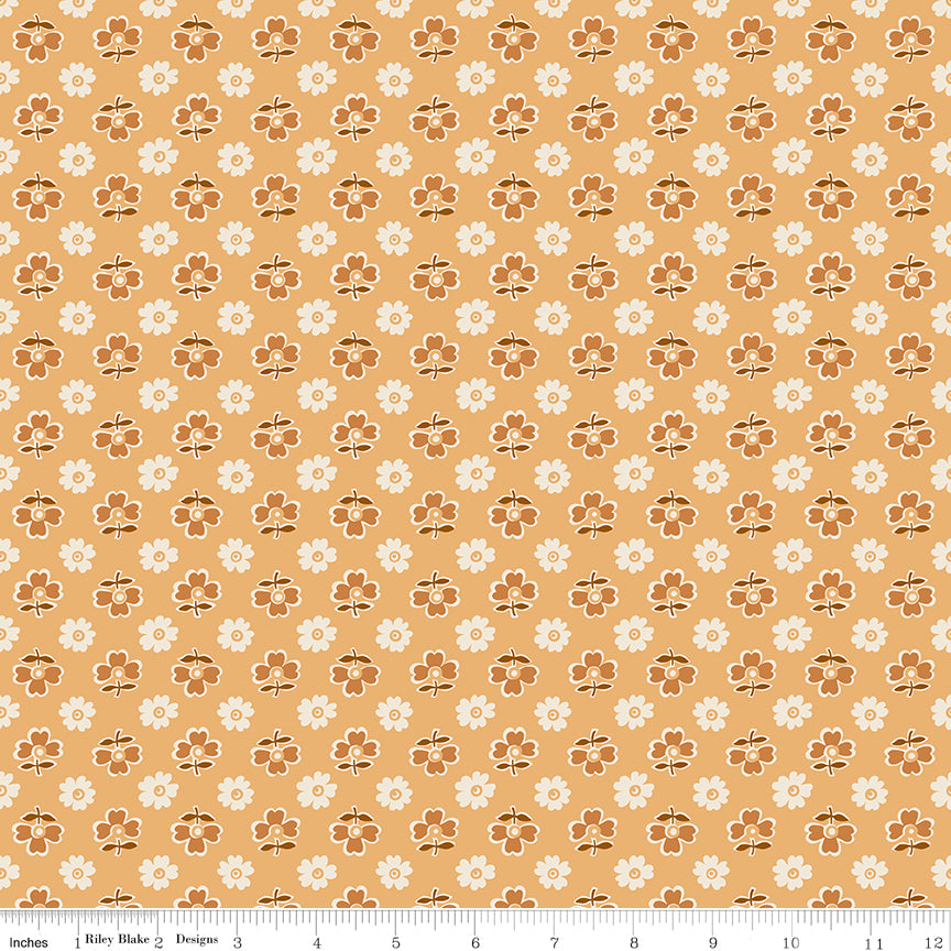 Yellow fabric with alternating flowers inspired by a vintage casserole dish.
