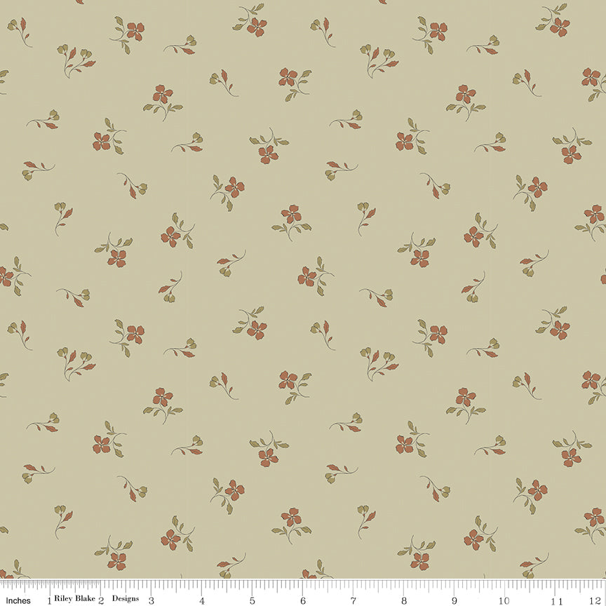 Green fabric with scattered sprigs of flowers and leaves.