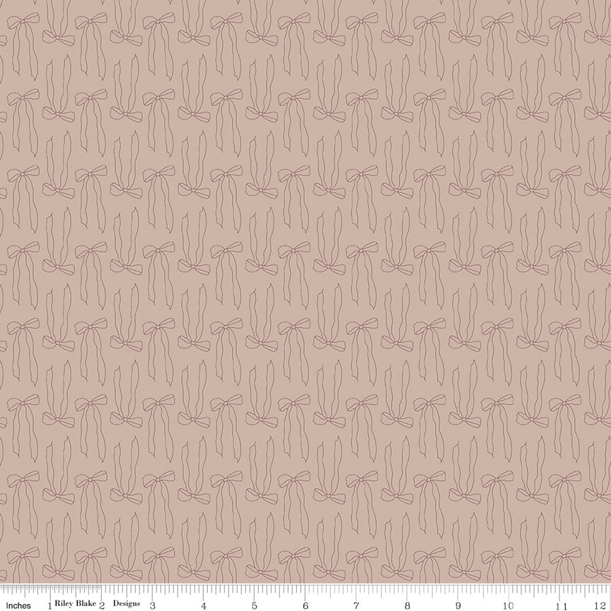 Brown fabric with line-drawn bows.