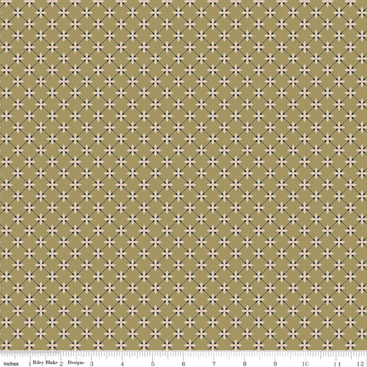 Green fabric with a lattice grid with petals at the intersections.