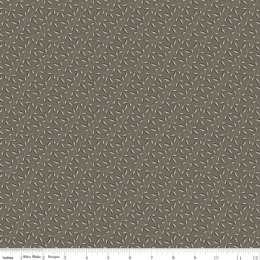 Gray fabric with sprigs of leaves.