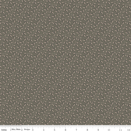 Gray fabric with sprigs of leaves.