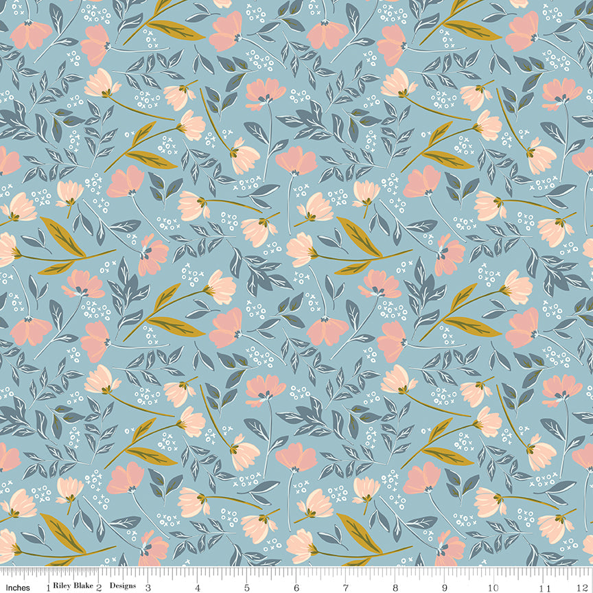 Blue fabric with sprigs of flowers and leaves with X's and O's.