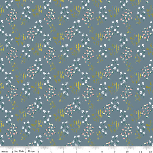 Blue fabric with fields of flowers.