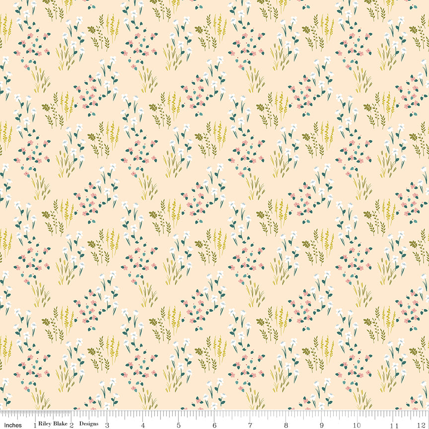 Pink fabric with fields of flowers.