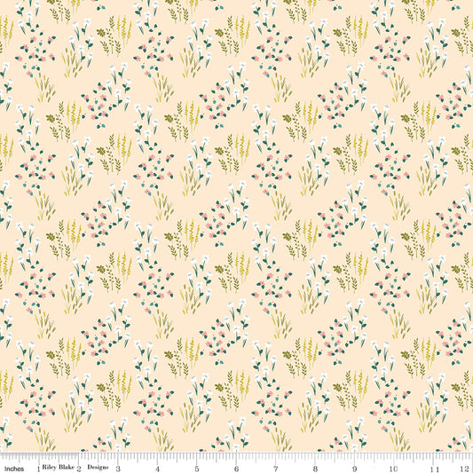 Pink fabric with fields of flowers.
