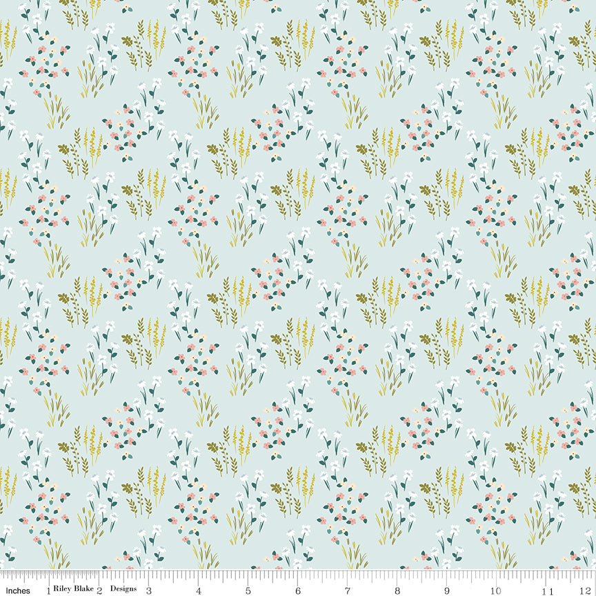 Blue fabric with fields of flowers.