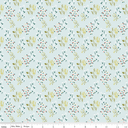 Blue fabric with fields of flowers.