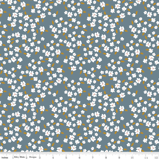 Blue fabric with white blossoms.