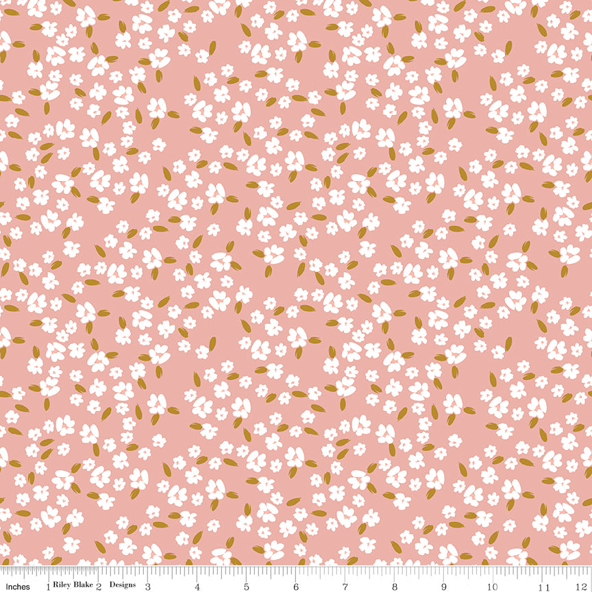 Coral fabric with white blossoms.