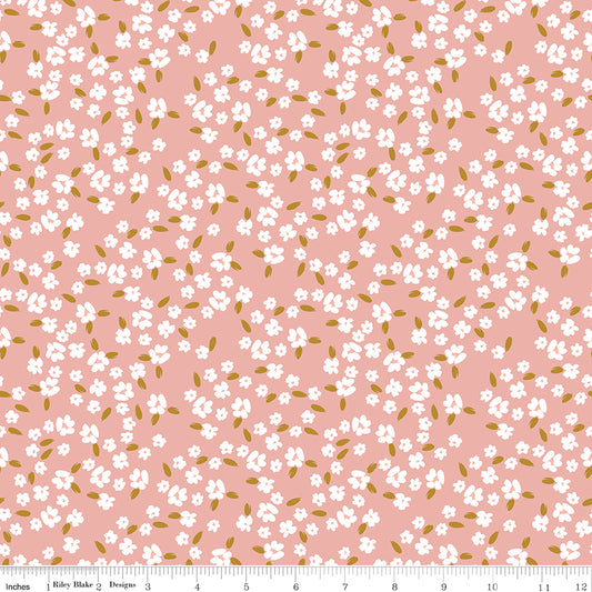 Coral fabric with white blossoms.