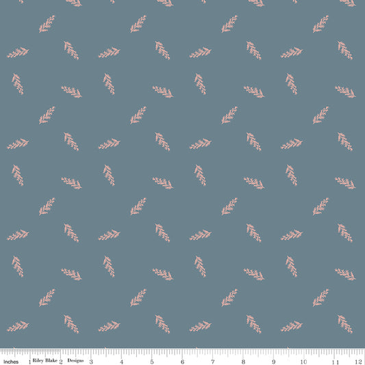 Blue fabric with scattered leaves.