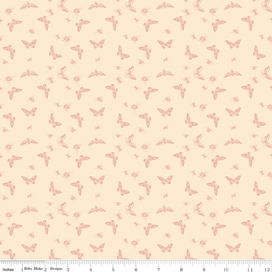 Pink fabric with little winged bugs.