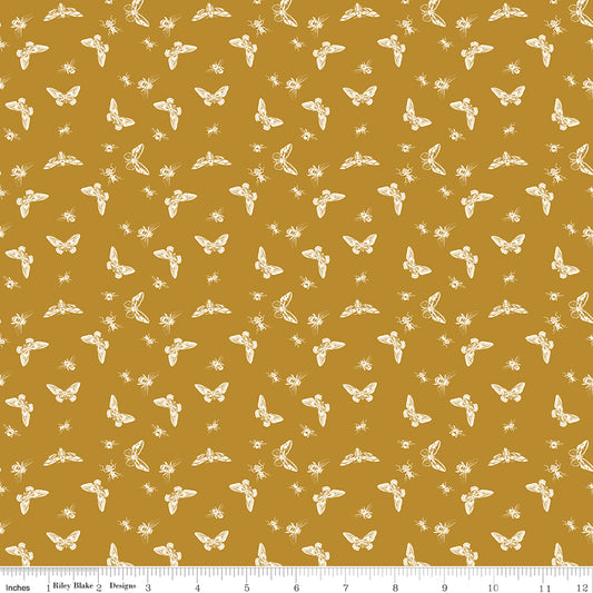 Orange fabric with little winged bugs.
