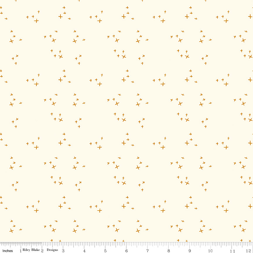 Cream fabric with scattered X's.