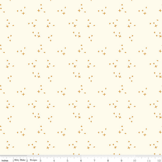 Cream fabric with scattered X's.