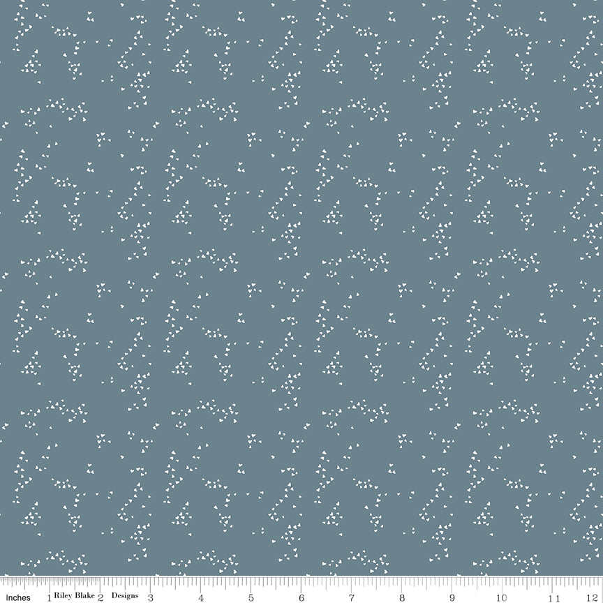 Blue fabric with scattered hearts.