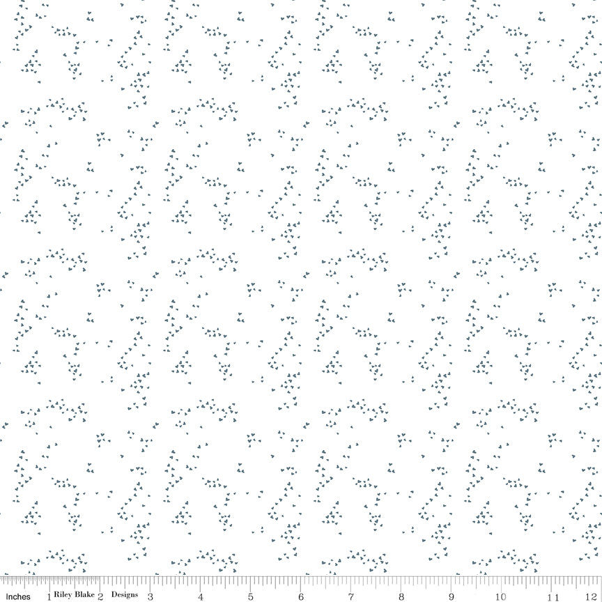 Off-white fabric with scattered hearts.