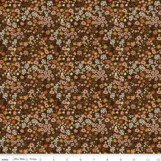 Dark coffee brown quilting cotton fabric with an all-over meadow floral print in blush pink, coral, cream, and golden green. Worth Repeating by Sandy Gervais for Riley Blake Designs