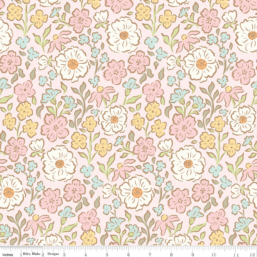 Pink fabric with small sprigs of flowers and leaves.