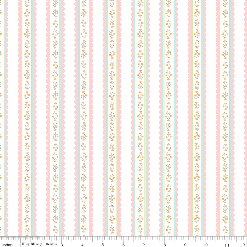 White fabric with scalloped stripes and sprigs of flowers.