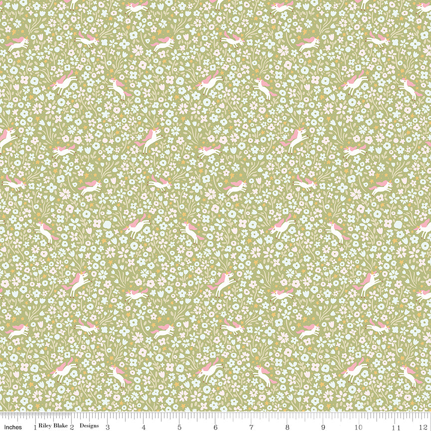 Green fabric with unicorns surrounded by flowers.