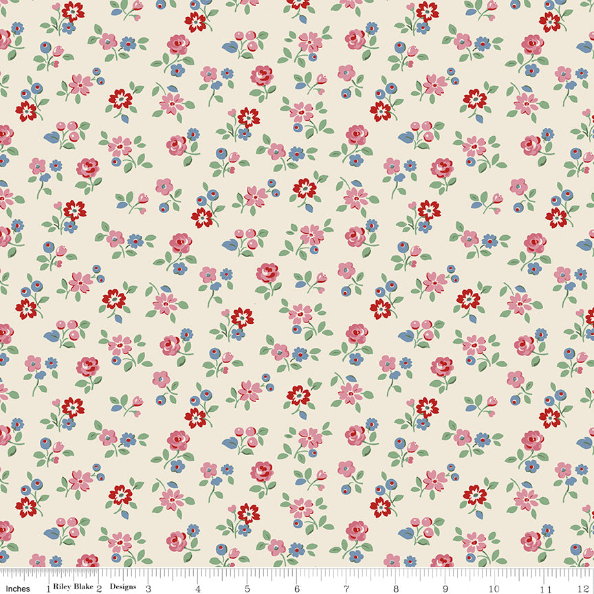 This print features sprigs of flowers and leaves and a cream background.