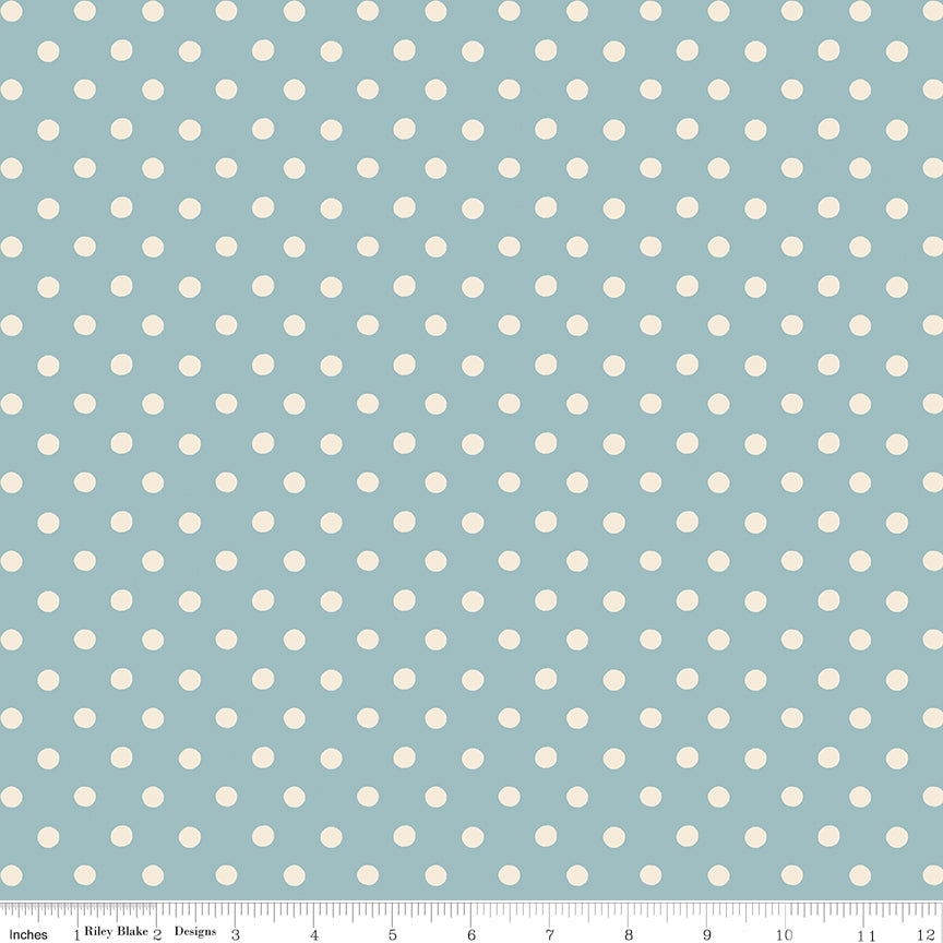 Fabric swatch with a beautiful light blue background with white polka dots.
