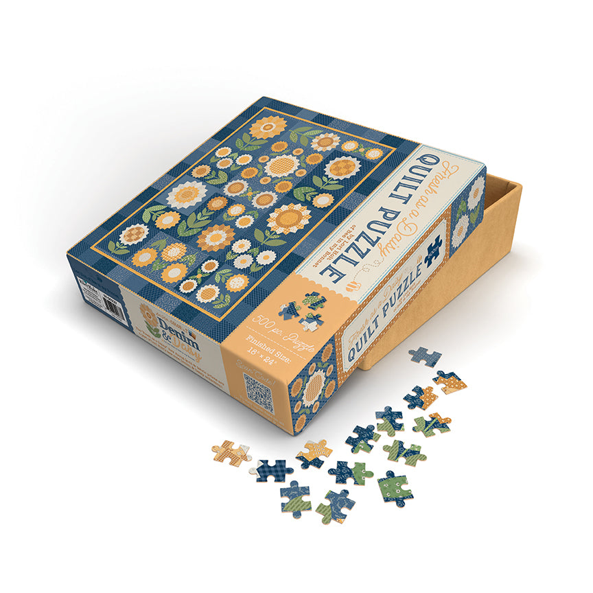 Lori Holt Fresh as a Daisy 500-piece quilt puzzle showing the Denim & Daisy quilt in blue and yellow.