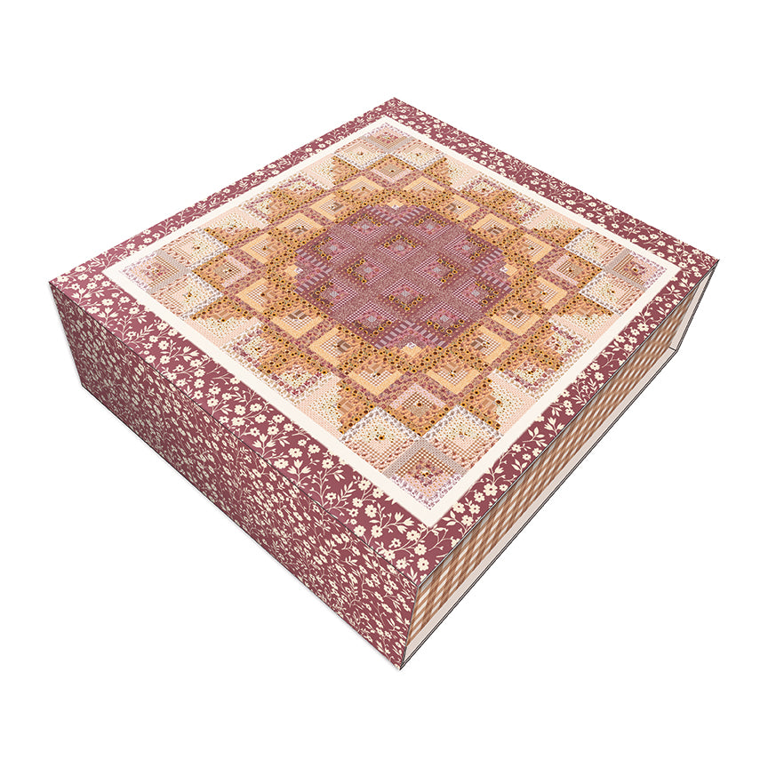 Decorative box with intricate pattern on a white background containing the Sunflower in the Cabin Quilt Kit.